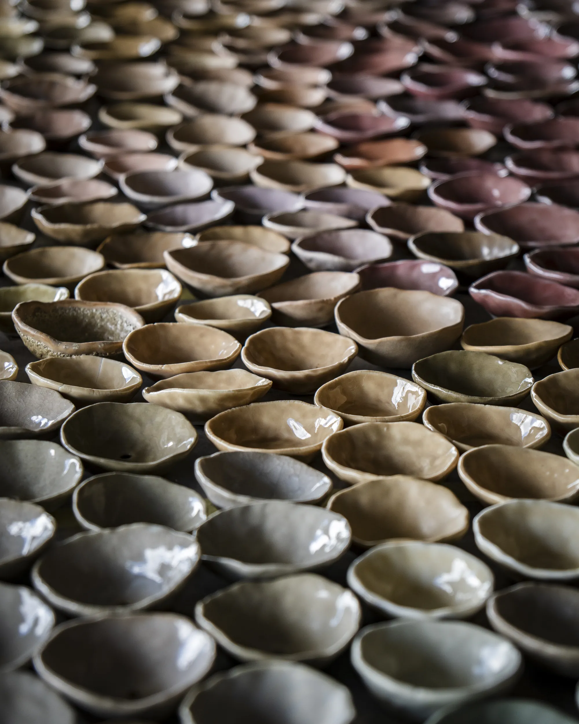 Rows of reclaimed ceramic cups given a second life
